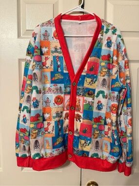 Vibrant Multicolor Storybook Cardigan with Red Trim
